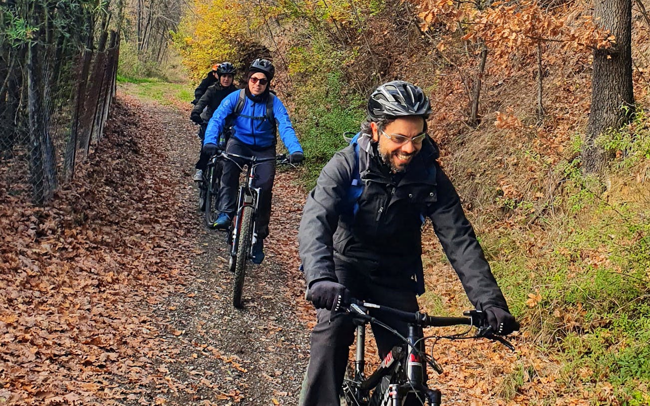 Cyclists on a trail during a 3-hour e-bike tour in Bologna.