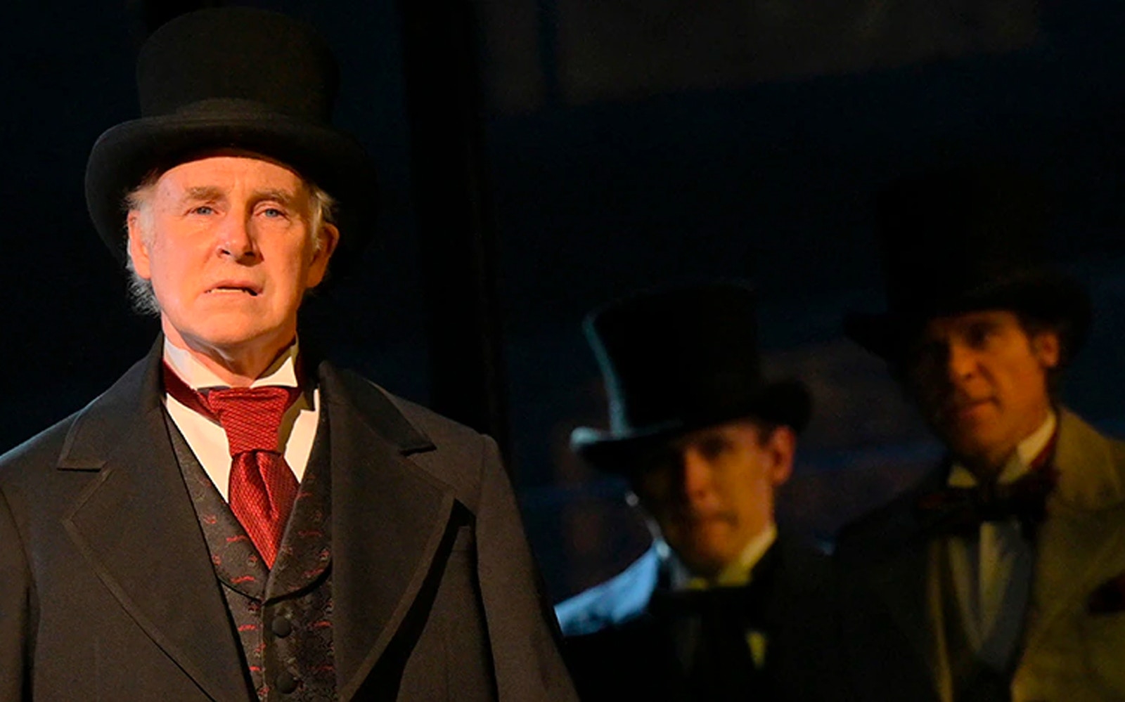 Gentleman in period costume with top hat at Paradise Square performance.