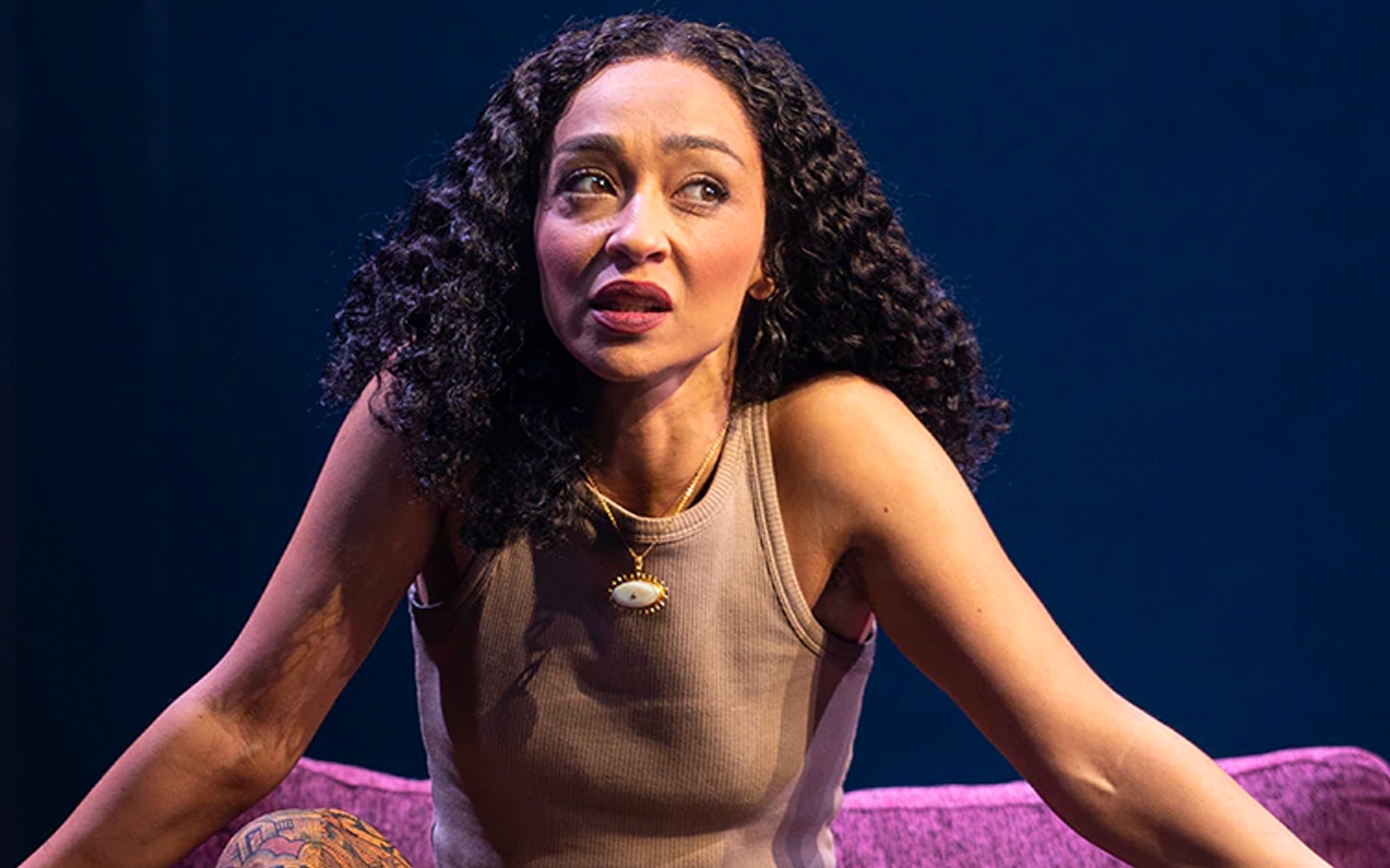 Actor performing in a scene from Macbeth on stage.