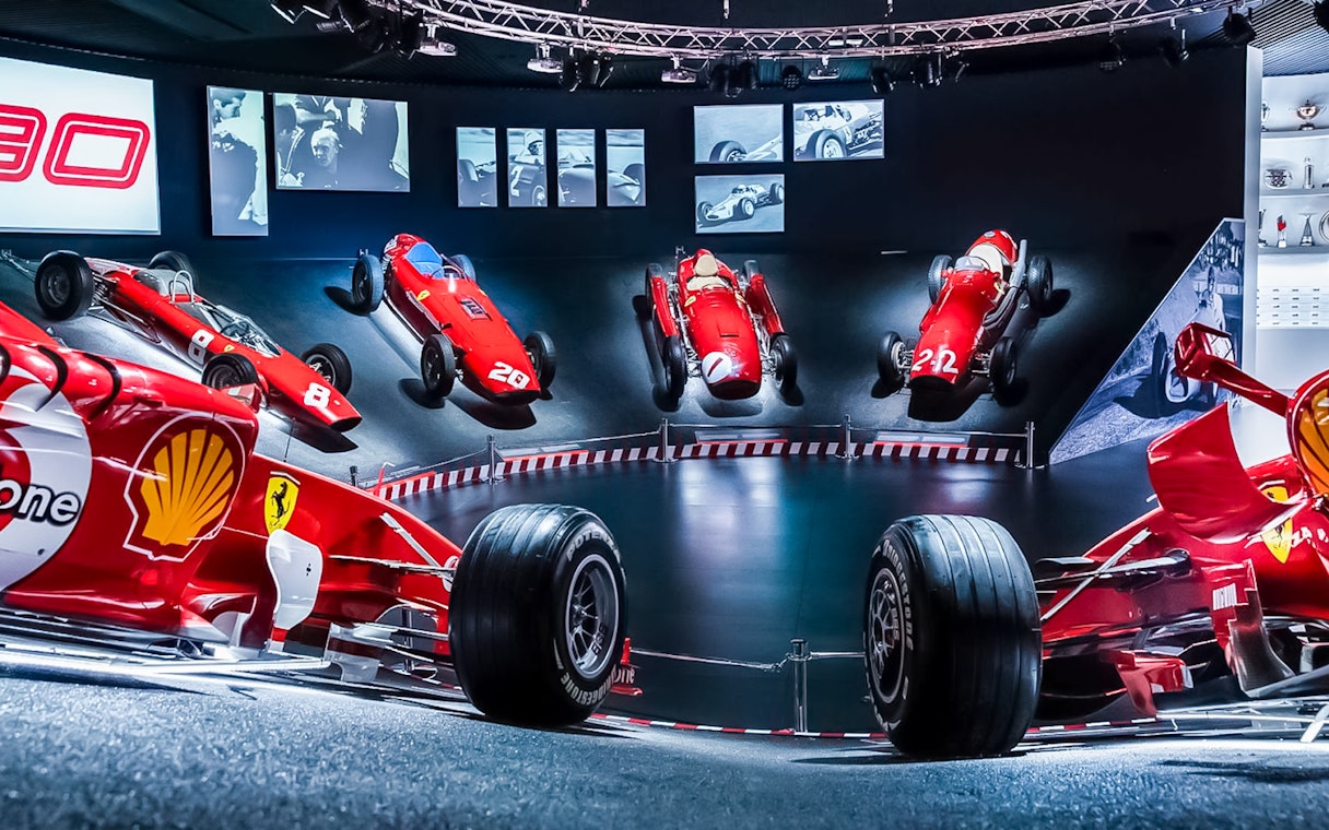 Ferrari race cars displayed at Ferrari Museum in Maranello.