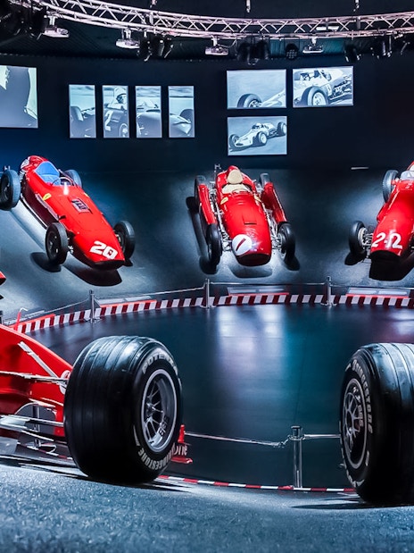 Ferrari race cars displayed at Ferrari Museum in Maranello.