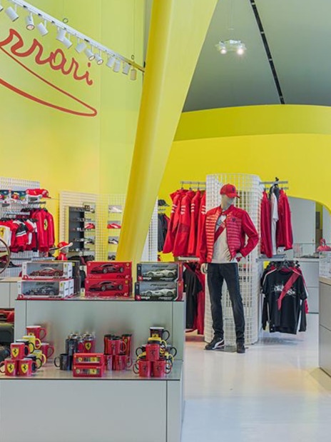Ferrari merchandise display at Museo Enzo Ferrari Modena.