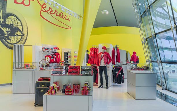 Ferrari merchandise display at Museo Enzo Ferrari Modena.