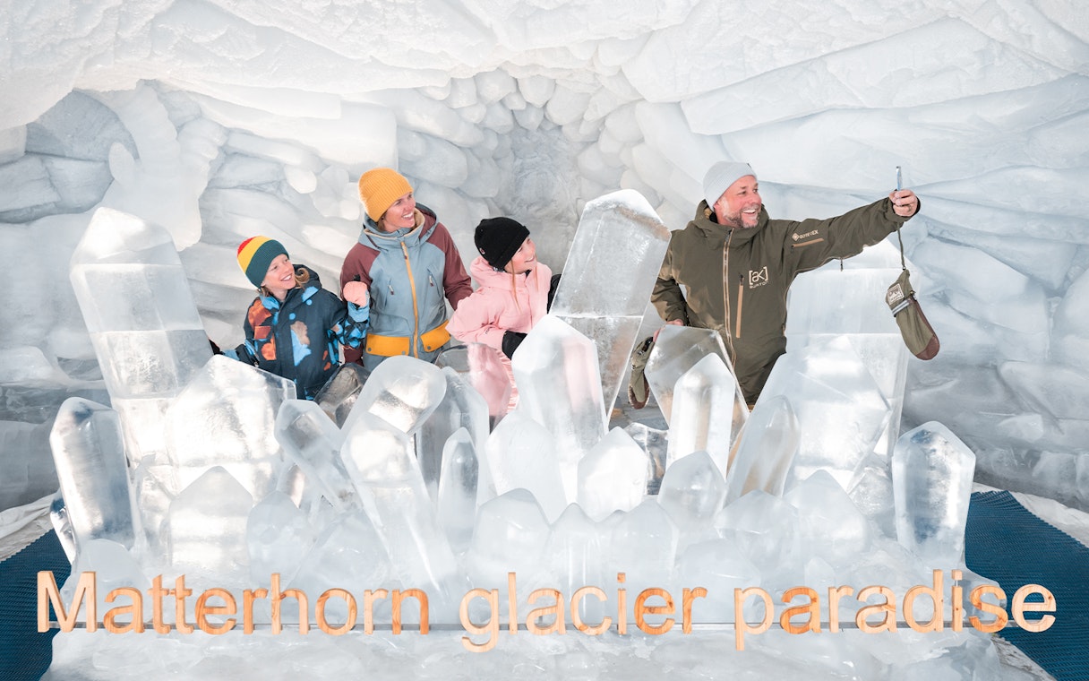 Visitors exploring ice sculptures at Matterhorn Glacier Paradise.