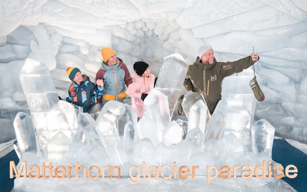 Visitors exploring ice sculptures at Matterhorn Glacier Paradise.