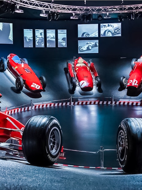 Ferrari race cars displayed at Maranello Ferrari Museum, part of the Modena Enzo Ferrari Museum combo ticket.