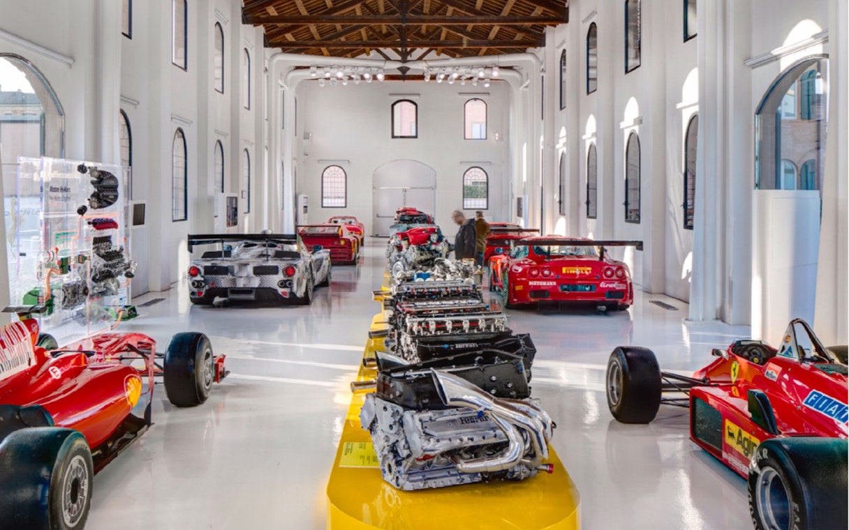 Ferrari engines and cars displayed at Maranello Ferrari Museum, Italy.