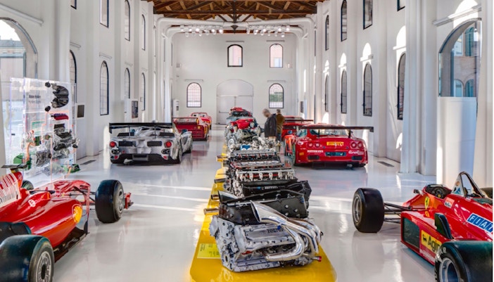 Ferrari engines and cars displayed at Maranello Ferrari Museum, Italy.