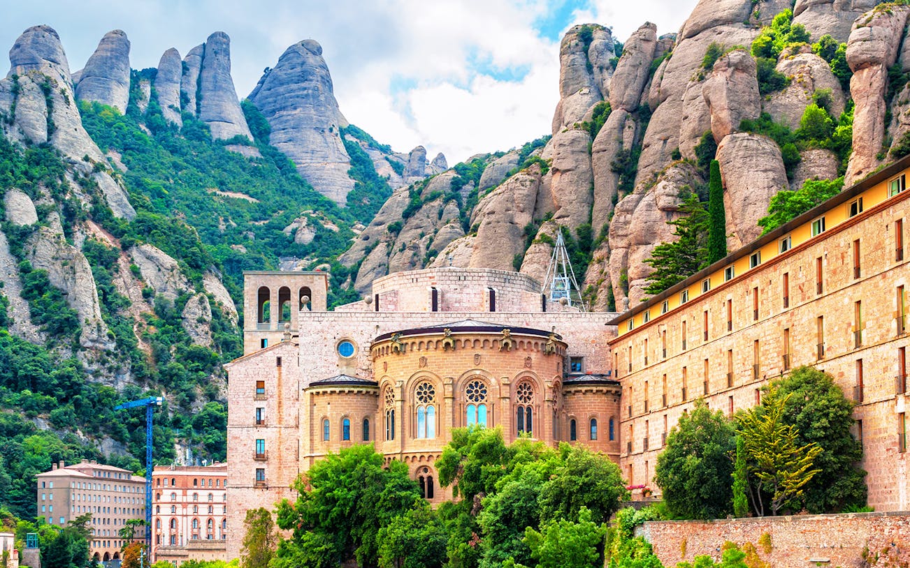 Montserrat Monastery with rocky mountain backdrop in Catalonia, Spain.