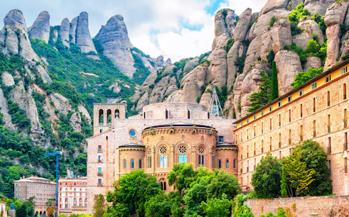 Montserrat Monastery with rocky mountain backdrop in Catalonia, Spain.