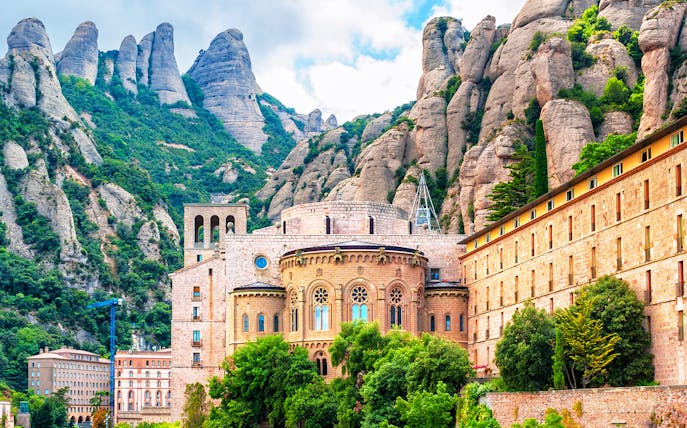 Montserrat Monastery with rocky mountain backdrop in Catalonia, Spain.