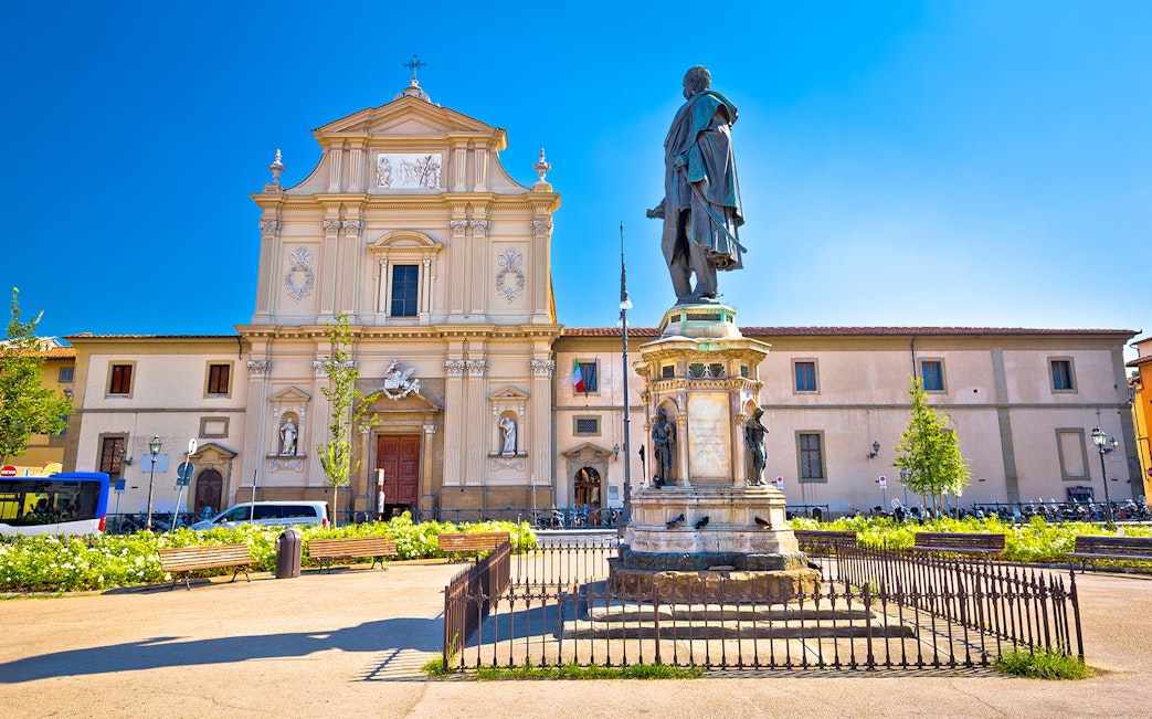 San Marco Museum facade and statue in Florence, Italy.
