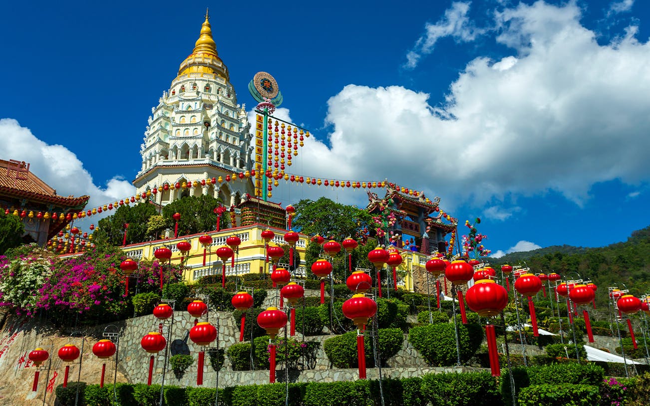 Kek Lok Si Temple with red lanterns in Penang, Malaysia, during the Round Island Full Day Tour.