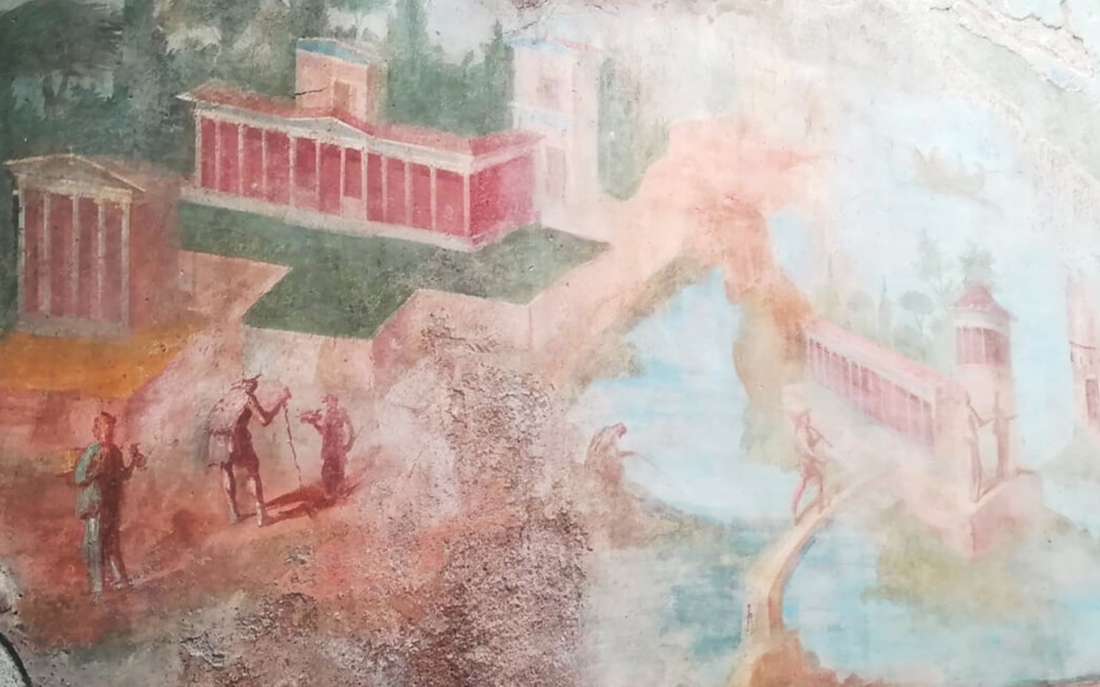 Ancient fresco depicting Roman architecture and figures in Pompeii.