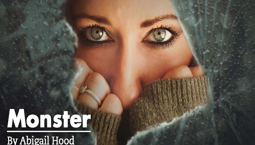 Close-up of a person's eyes peering through a cracked surface, related to "Monster.