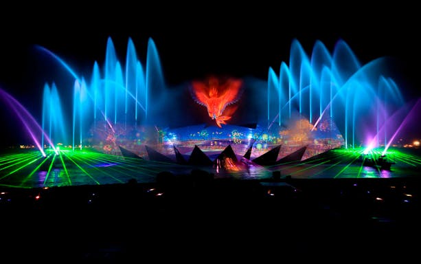 Wings of Time light and water show at Sentosa with vibrant lasers and fountains.