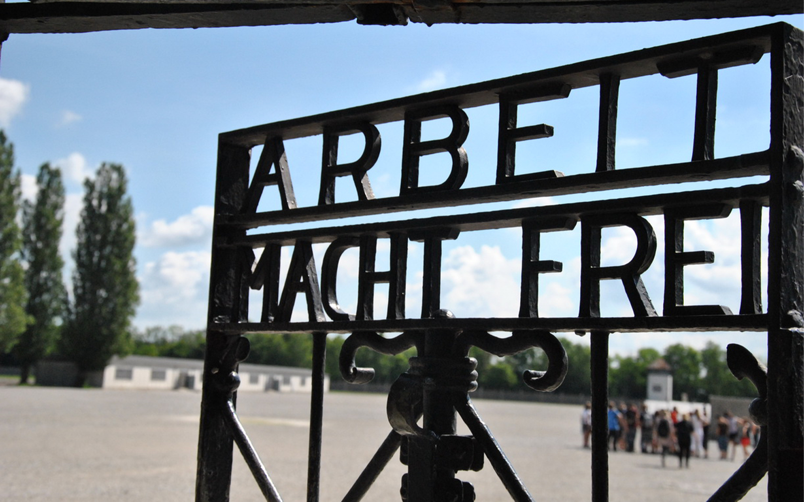 Entrance gate with "Arbeit Macht Frei" at Dachau Memorial, Germany.
