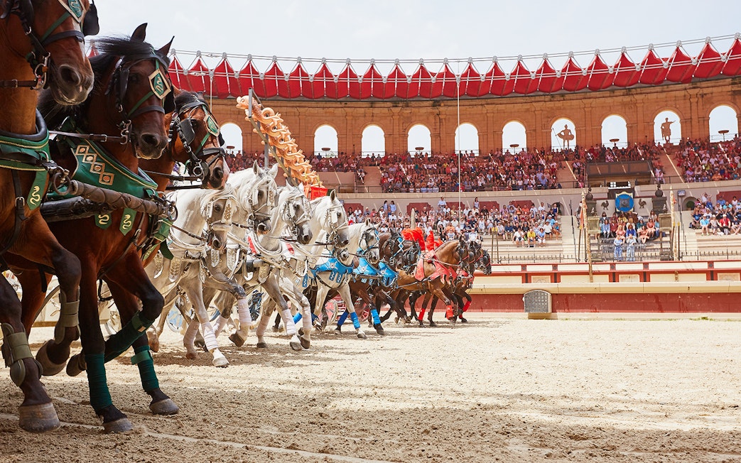 Horses in a Puy du Fou arena during a Viking-themed show.