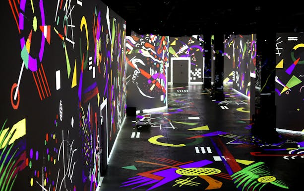 Digital art projections at Infinity des Lumières exhibit in Dubai.