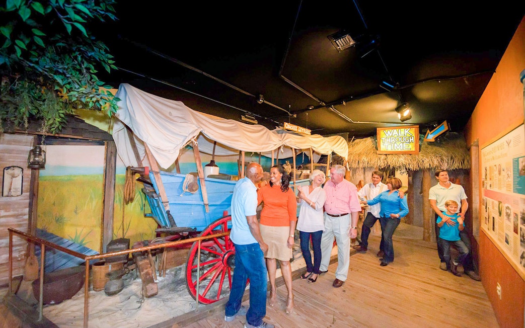 Visitors exploring exhibits at St. Augustine History Museum.