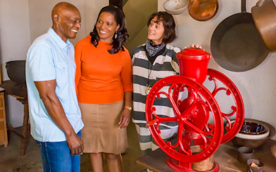 Visitors explore a historic kitchen exhibit at St. Augustine Old Jail Museum.