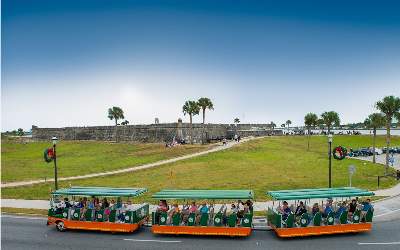 Trolley tour passing Castillo de San Marcos in St. Augustine.