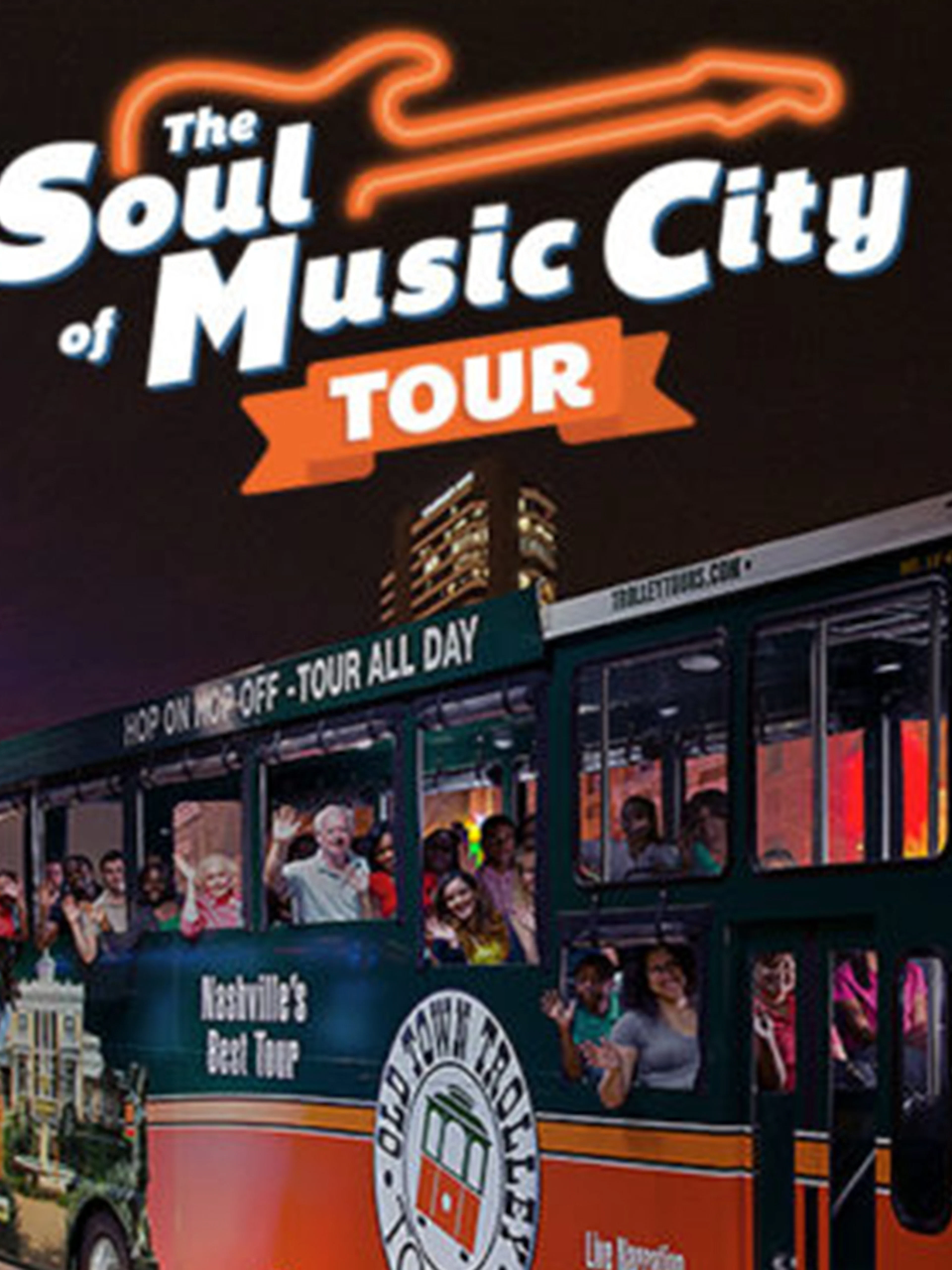 Nashville night tour bus with passengers on a city street, neon lights in the background.
