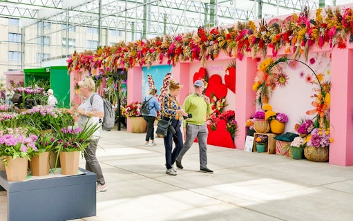 Visitors exploring floral displays at Floriade Expo 2022 in Almere.