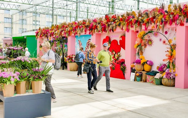 Visitors exploring floral displays at Floriade Expo 2022 in Almere.