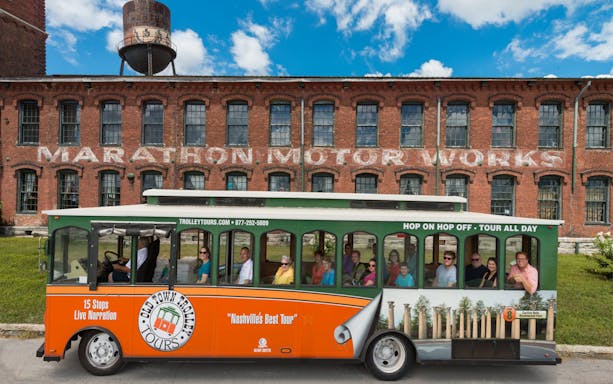 Nashville hop-on hop-off trolley in front of Marathon Motor Works building.