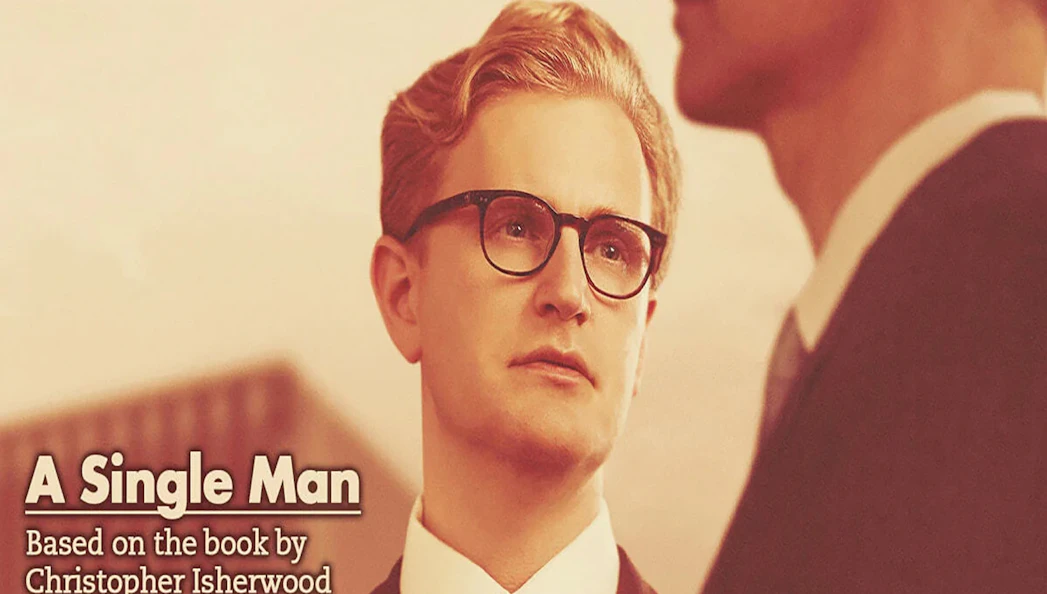 Man in glasses looking at another person, text reads "A Single Man" based on Christopher Isherwood's book.