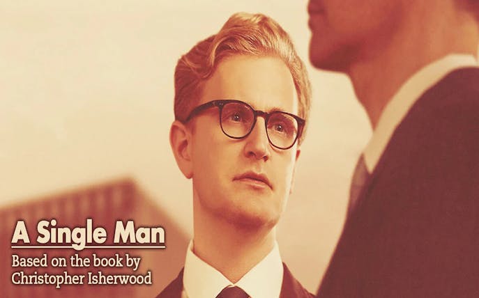 Man in glasses looking at another person, text reads "A Single Man" based on Christopher Isherwood's book.