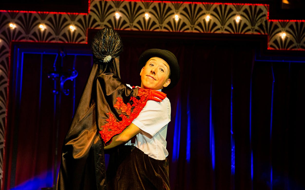 Performer in 1920s attire on stage during Golden Years - the 20's Varieté Revue No 2.
