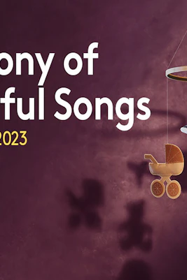 Górecki's Symphony of Sorrowful Songs poster with mobile of toys and military items.