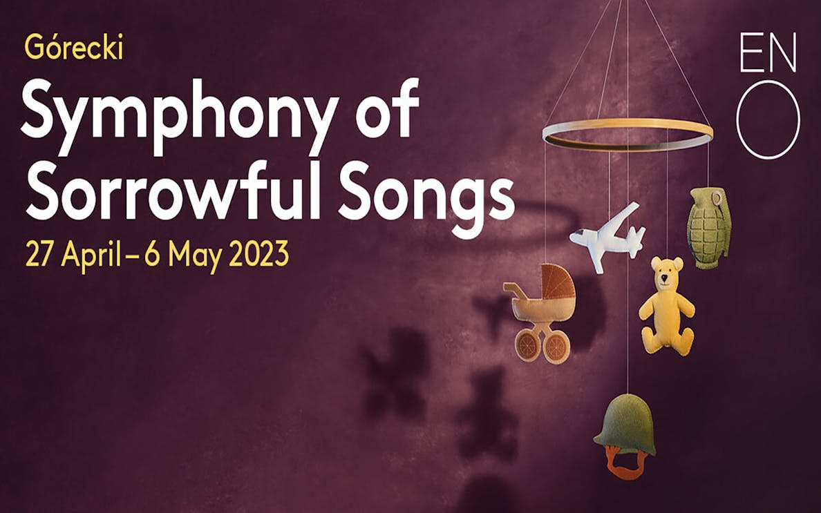 Górecki's Symphony of Sorrowful Songs poster with mobile of toys and military items.