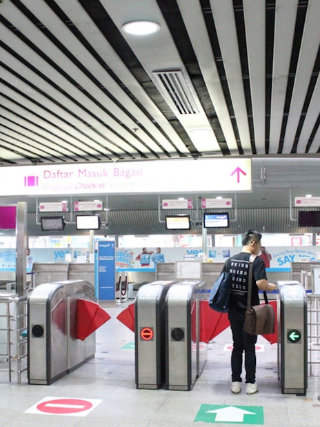 KLIA Ekspres ticket gate at KL City Air Terminal, Kuala Lumpur.
