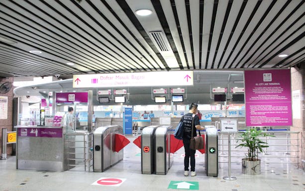KLIA Ekspres ticket gate at KL City Air Terminal, Kuala Lumpur.