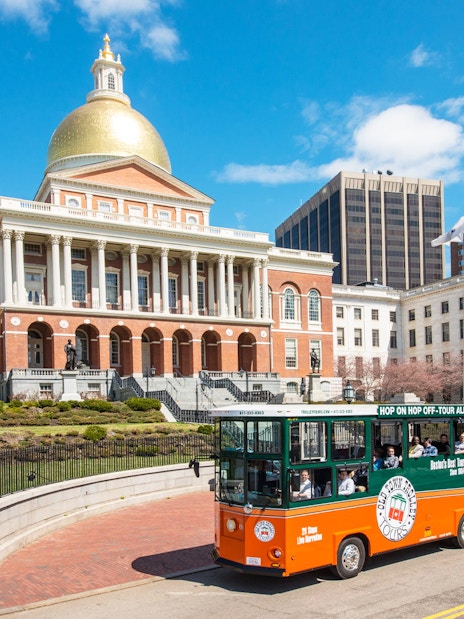Boston Old Town Trolley passing Massachusetts State House.