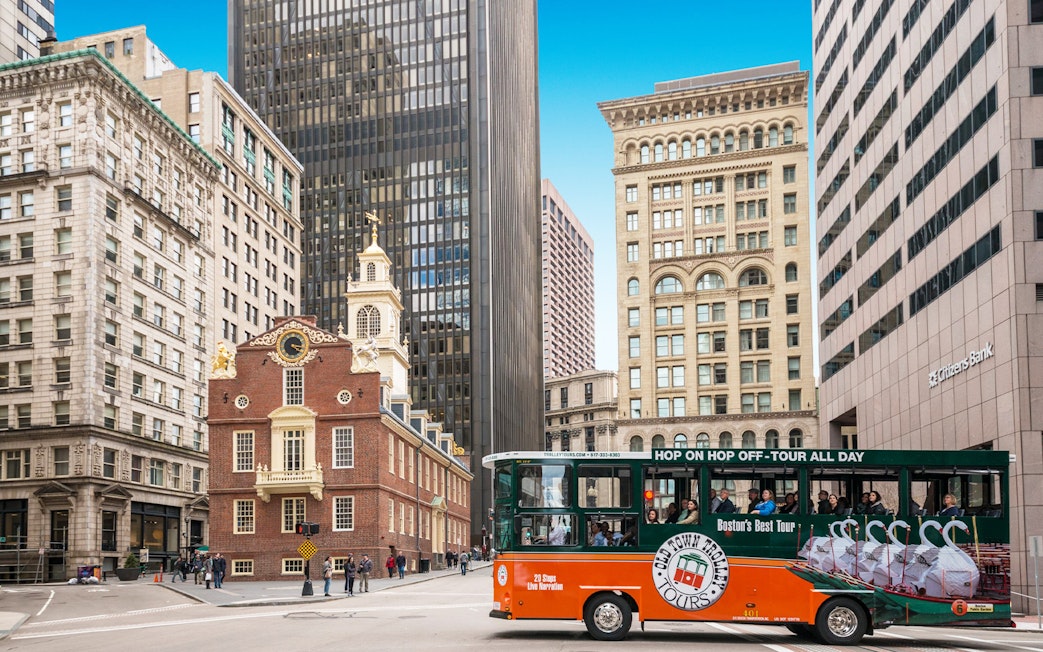 Old Town Trolley passing by the Old State House in Boston.