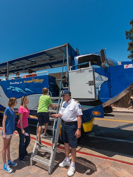 Visitors boarding the San Diego SEAL Tour vehicle at Seaport Village.