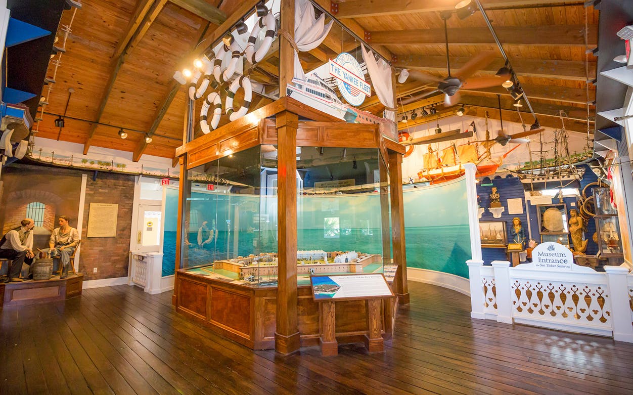 Key West Sails to Rails Museum interior with ship models and historical exhibits.
