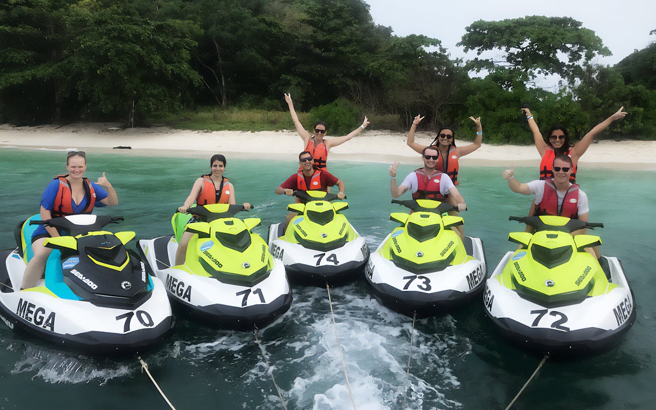 Group on jet skis near Langkawi beach during Makan Makan Food Tour.