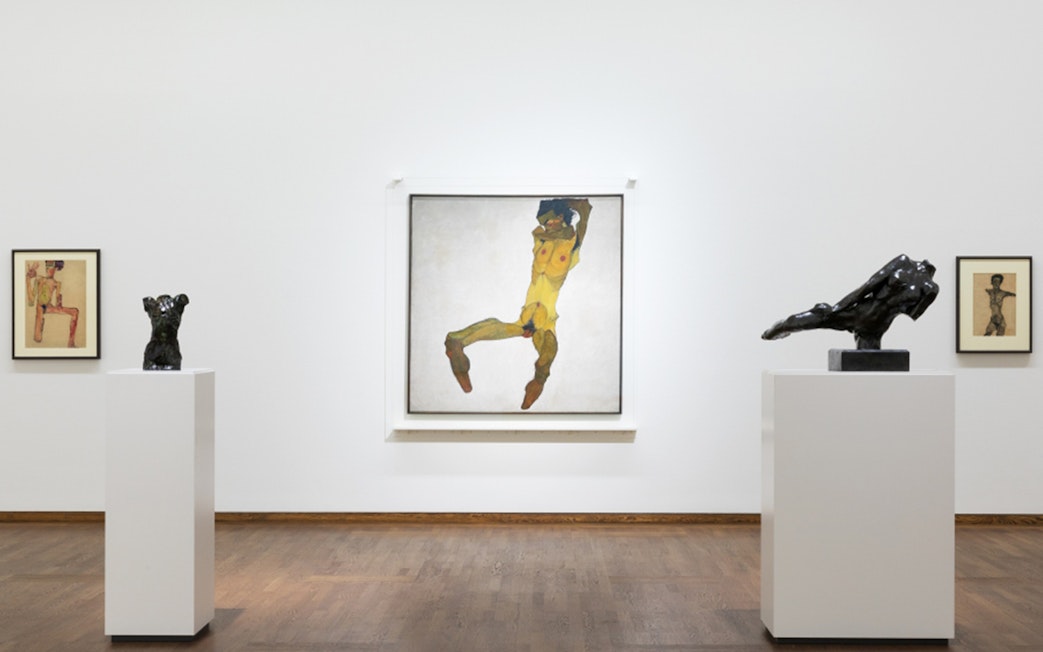 Art exhibits at Leopold Museum, Vienna, featuring sculptures and paintings.