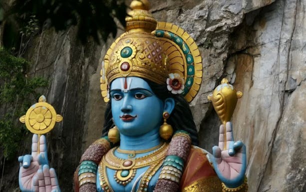 Statue of Hindu deity at Batu Caves, Kuala Lumpur Countryside Exploration.