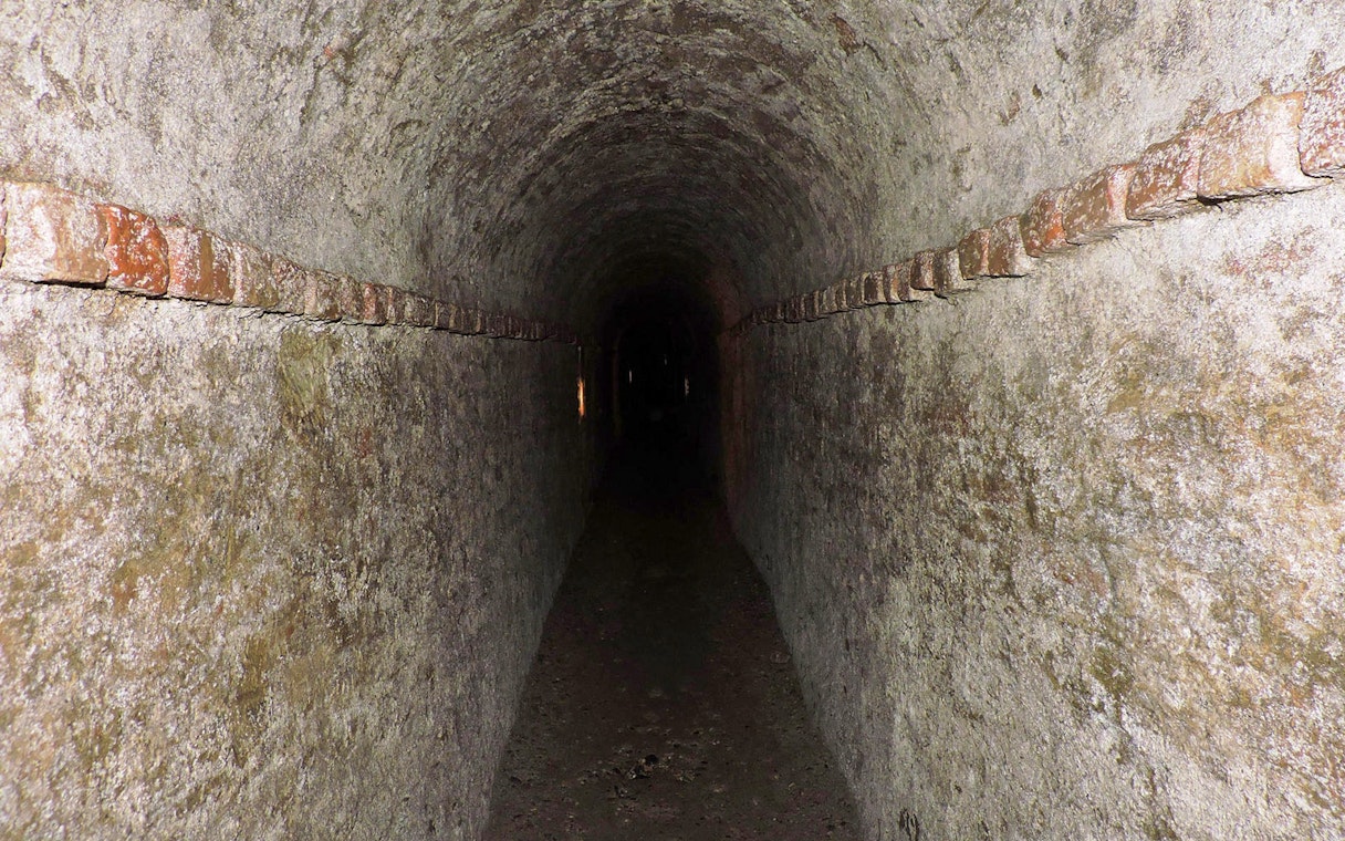 Underground tunnel in Turin, Italy, part of a guided walking tour.