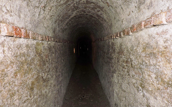 Underground tunnel in Turin, Italy, part of a guided walking tour.