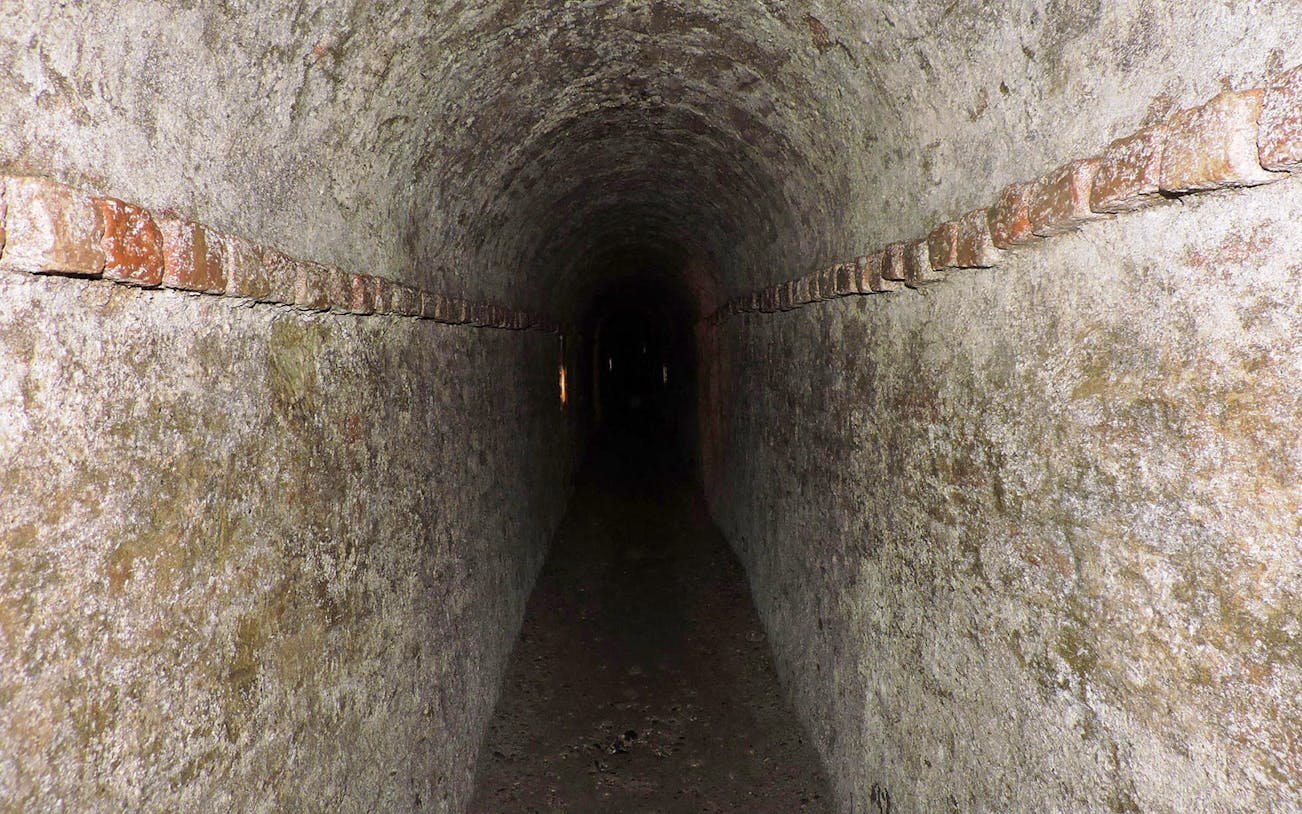 Underground tunnel in Turin, Italy, part of a guided walking tour.
