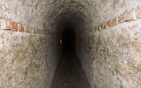 Underground tunnel in Turin, Italy, part of a guided walking tour.