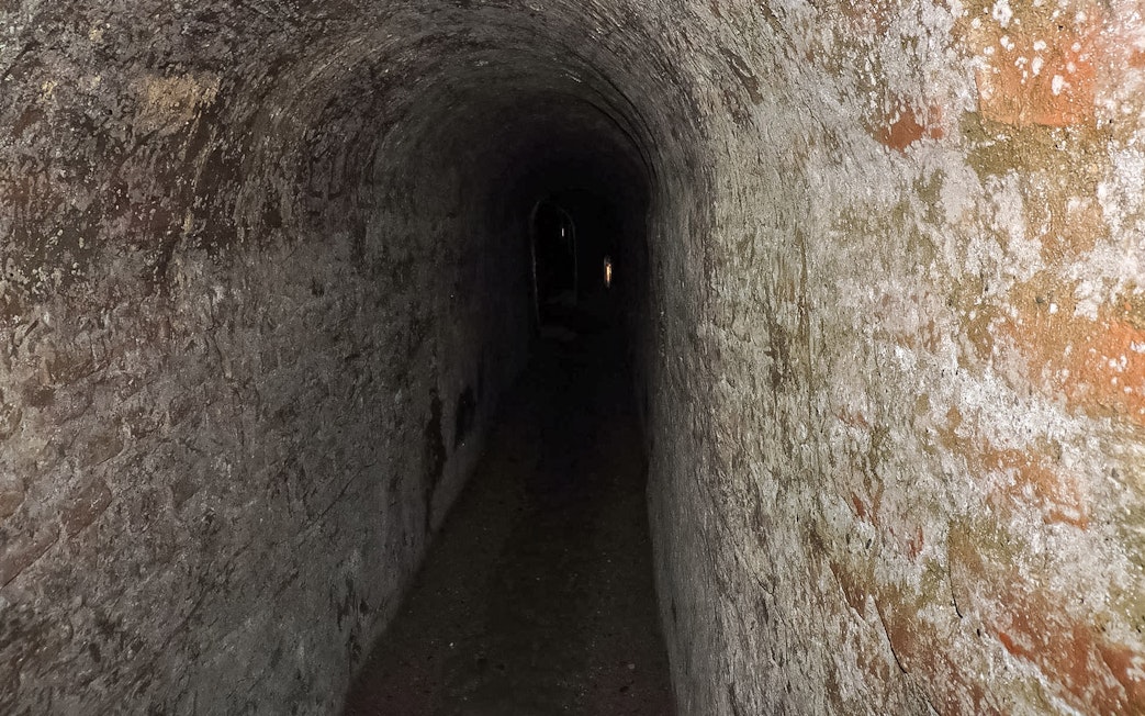 Underground tunnel in Turin, Italy, part of a guided walking tour.