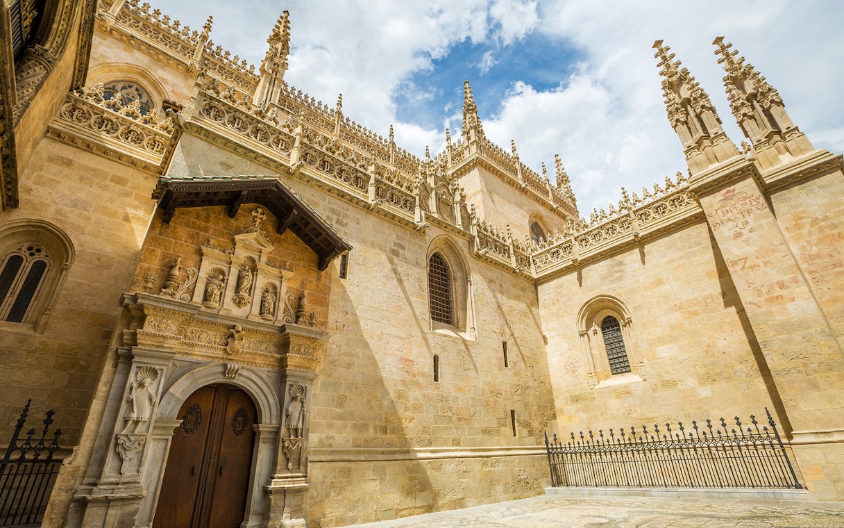 Royal Chapel of Granada exterior with ornate Gothic architecture.